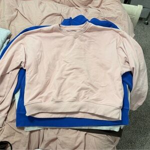Pink and Blue Sweatshirts